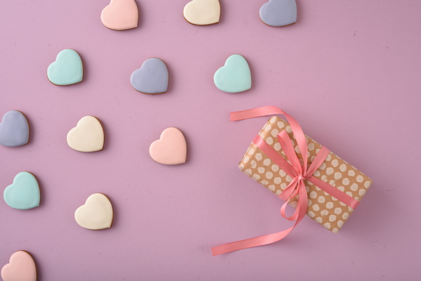 Gift and Multicolored Heart-Shaped Cookies